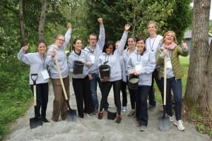 This camper team gets energized while working to lay gravel.