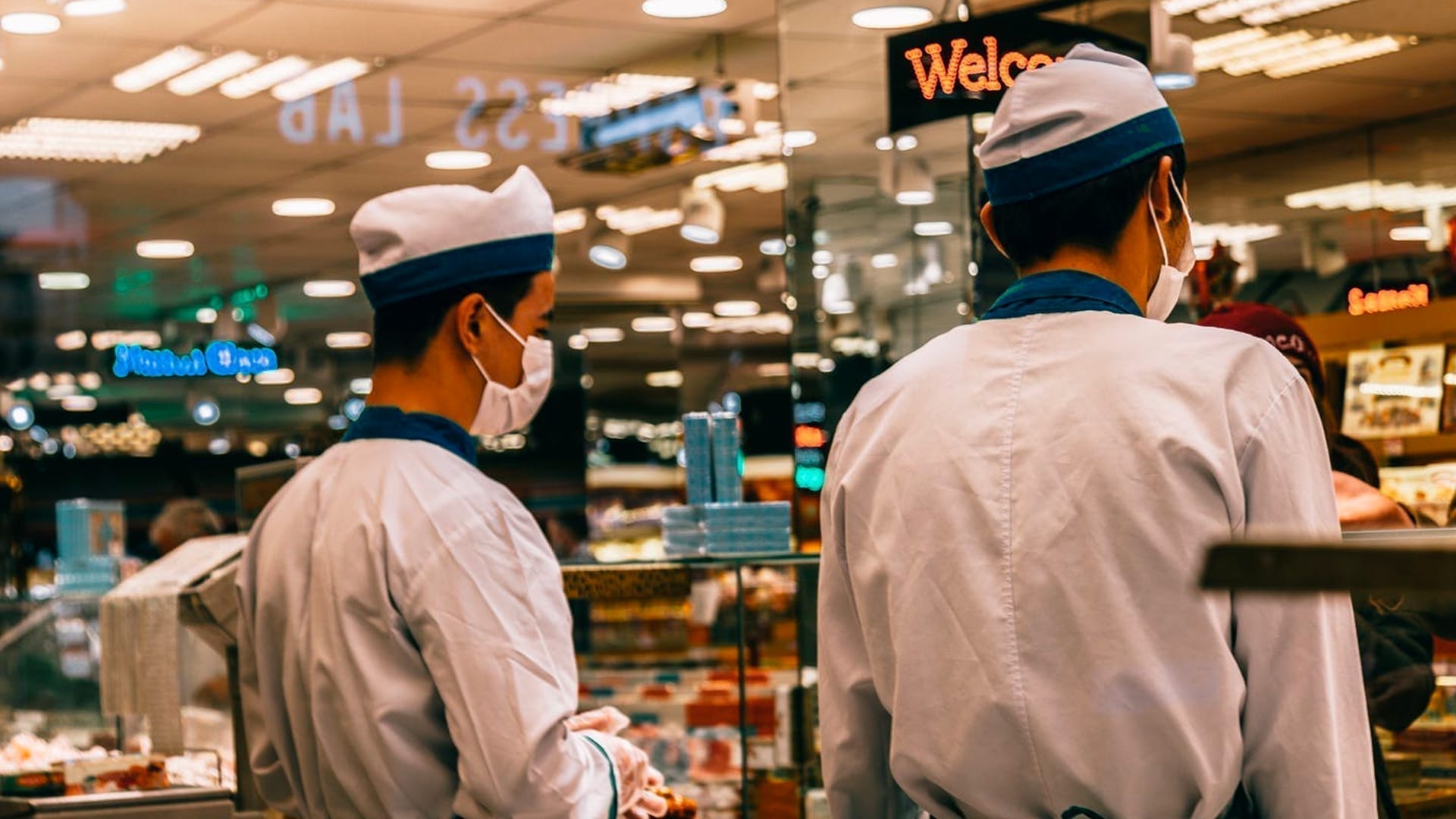 How to Engage Retail Employees Post-Pandemic - two retail food workers behind a shop counter