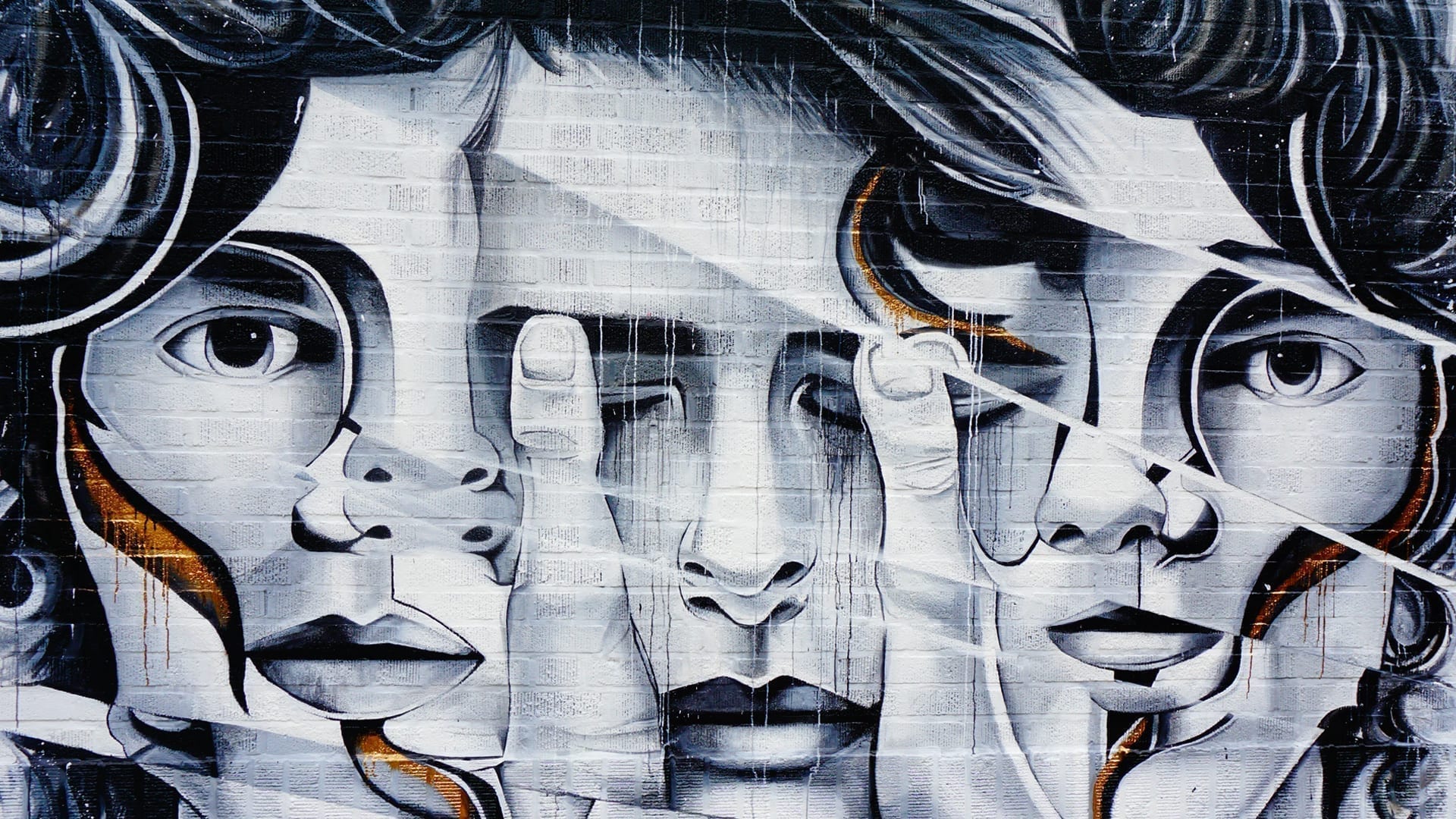 Letting Go of Imposter Syndrome - abstract street art painting of faces