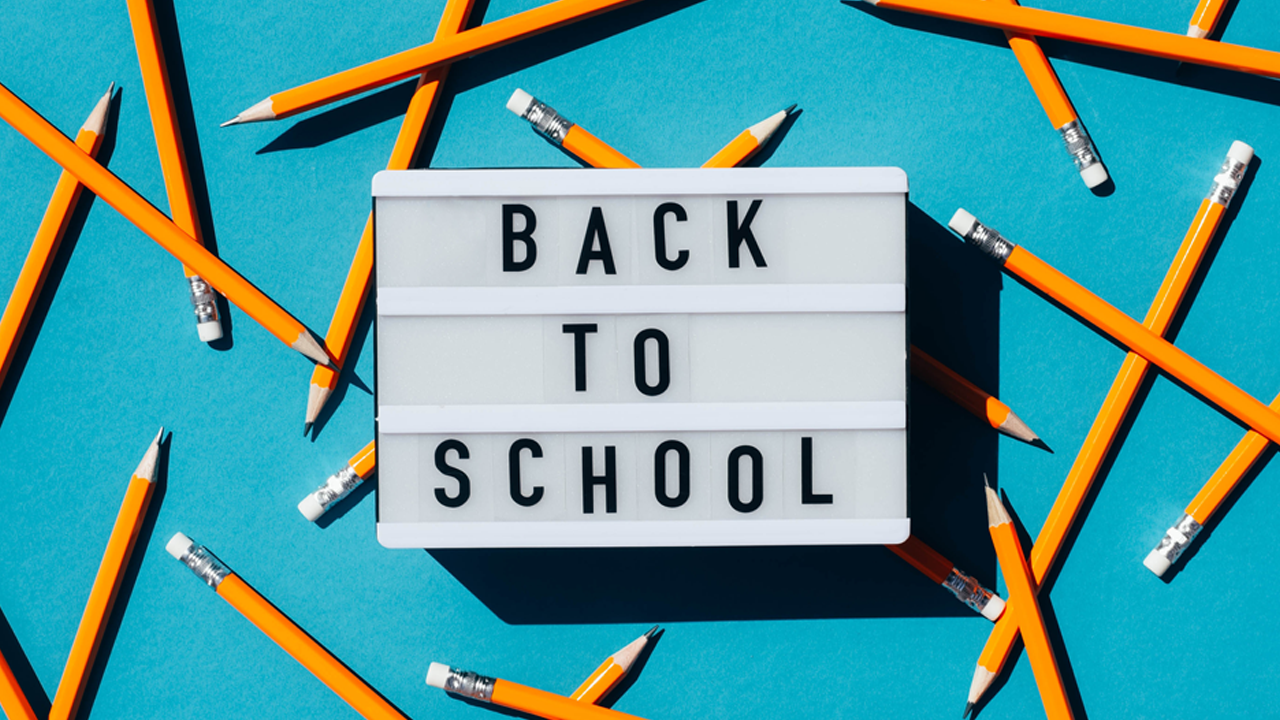 Back to School Sign with pencils around it